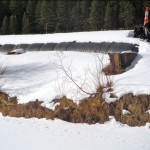 A water filled berm keeps the Upper Truckee River out of the new channel near Lake Tahoe Airport. Photo/Kathryn Reed