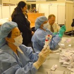 Barton P\pharmacy techs, from left, Michelle Murphy and Tim Mattson are assisted by Barton pharmacy Director Barry Keil in separating the H1N1 vaccines into individual doses. Photo/Provided