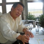 Sam Sonki Ahn goes over paperwork involving his lease with South Lake Tahoe to operate Chase's restauran. Photo/Kathryn Reed