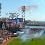 San Francisco Giants run onto the field opening day, April 9.