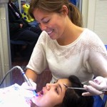Dr. Celeste Eckerman examines Heidy Carrillo's teeth. Photos/Jessie Marchesseau