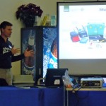 Ryder Evans talks about what is in a ShelterBox. Photo/Kathryn Reed