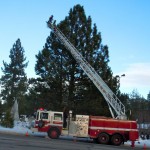 South Tahoe firefighters put up lights at the Y on Dec. 1. Photo/Kathryn Reed