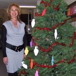 Zephyr Cove Elementary Principal Nancy Cauley with the Giving Tree. Photo/Tracy Owen Chapman