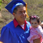 Fidel Valdez Moya with his daughter in hand graduates June 10 from Mt. Tallac High School. Photos/Kathryn Reed