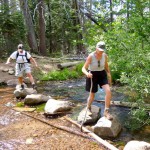 Sue Wood and Cleo Reed cross a stream on hike to Dardanelles Lake. Photos/Kathryn Reed