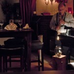 Frank Benvenuto plays saxaphone for diners.