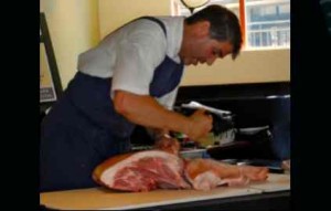 Reno chef Mark Estee demonstrates how to cut a whole pig. Photo/LTN file