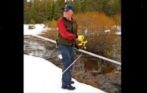 Frank Gehrke runs out of snow to measure on March 28 near the entrance of Sierra-at-Tahoe. Photo/Kathryn Reed