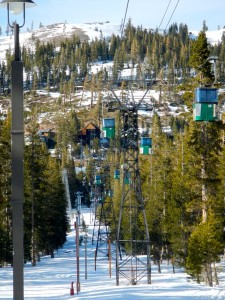 The gondola takes skiers and residents to the slopes or homes.