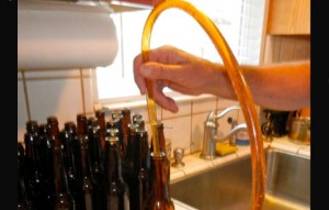 A stopper allows for the perfect amount of beer to fill each bottle. Photos/Kathryn Reed