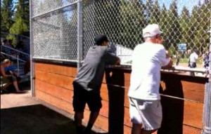 Boards make it hard to see the action at South Tahoe High's softball field from behind home plate. Photo/Provided