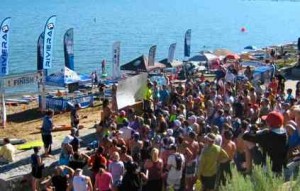 Hundreds gather at El Dorado Beach for last weekend's stand up paddleboard races. Photo/By Peggy Bourland-Madison 