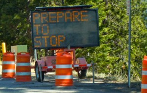 This sign would be common if Douglas County can find a way to pay for road improvements. Photo/LTN file