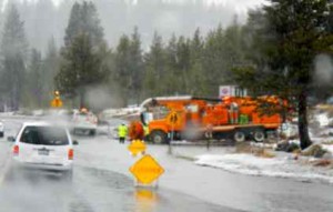 Caltrans works on the flooding issue in Meyers on Feb. 9. Photos/Kathryn Reed