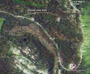 Here's a recent aerial view of Highway 50 in the Echo Summit area. The white X marks where photos #2, #3, and #4 were taken nearly 100 years ago on Johnson Pass Road connecting with Old Meyers Grade. That route still exists. Photo/Google Earth