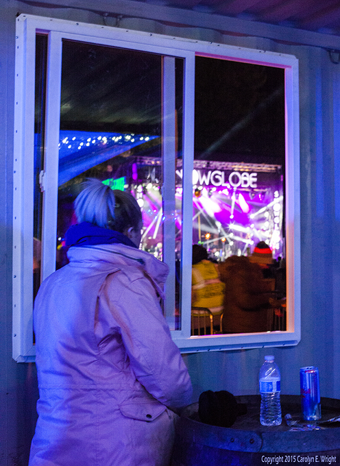 Khloe Layo has a front row seat from the VIP tent to the main stage. Photo Copyright 2015 Carolyn E. Wright