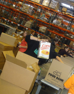 Volunteers with the Northern Nevada Food Bank load boxes for recipients. Photo/Provided