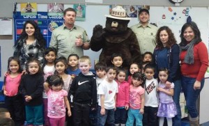  Smokey Bear and U.S. Forest Service Lake Tahoe Basin Management Unit Fire Prevention staff, Bill Sanders and Jacob Ruano, visited a Head Start class in South Lake Tahoe last week to teach the pre-kindergarten students about fire safety and fire prevention.  Photo credit:  Katie Oliver, Head Start. 