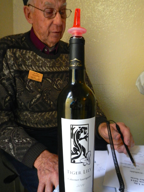 John MacCready of Sierra Vista pours a rare Cabernet release. Photo/Kathryn Reed