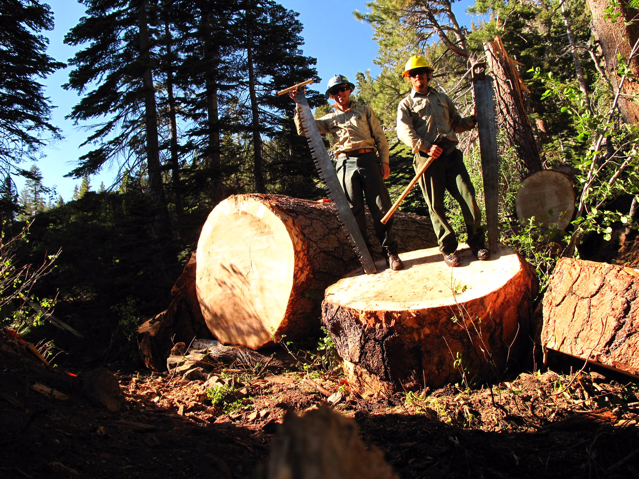 Chris Engelhardt, left, supervises the seasonal rangers in LTBMU. Photo/Provided