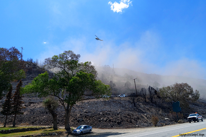 The Marina Fire has blackened much a swath of land bordering Highway 395. Photo Copyright 2016 Carolyn E. Wright