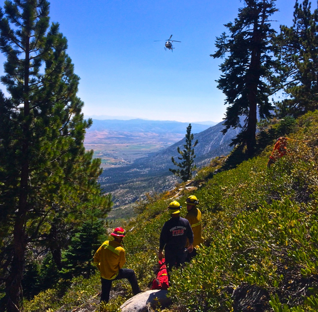 Crews work on an injured Tahoe Rim Trail worker on Aug. 25. Photo/Provided