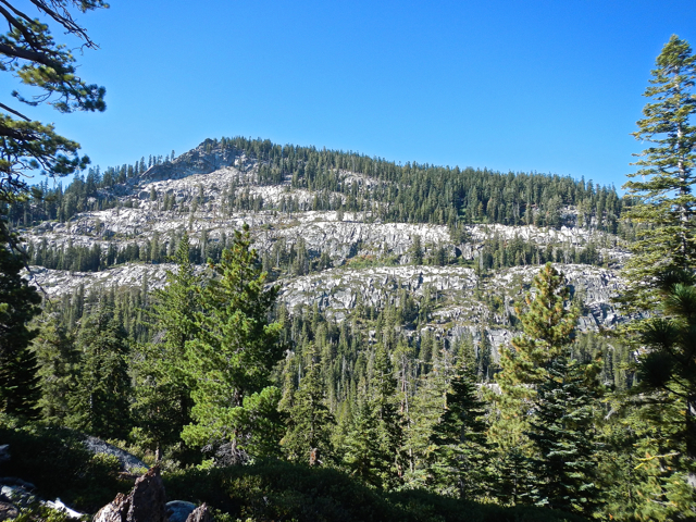 A wall of granite is visible at the start of the trail. Photo/Kathryn Reed