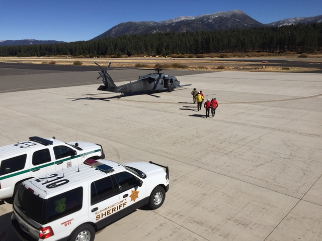 Search and rescue teams board an Air Force Blackhawk helicopter on Oct. 18 at Lake Tahoe Airport. Photo/LTN