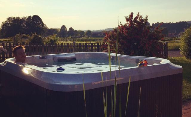 Tim Jitloff hanging out in his Jacuzzi, one of his sponsors, at home in Germany. Photo/USSA