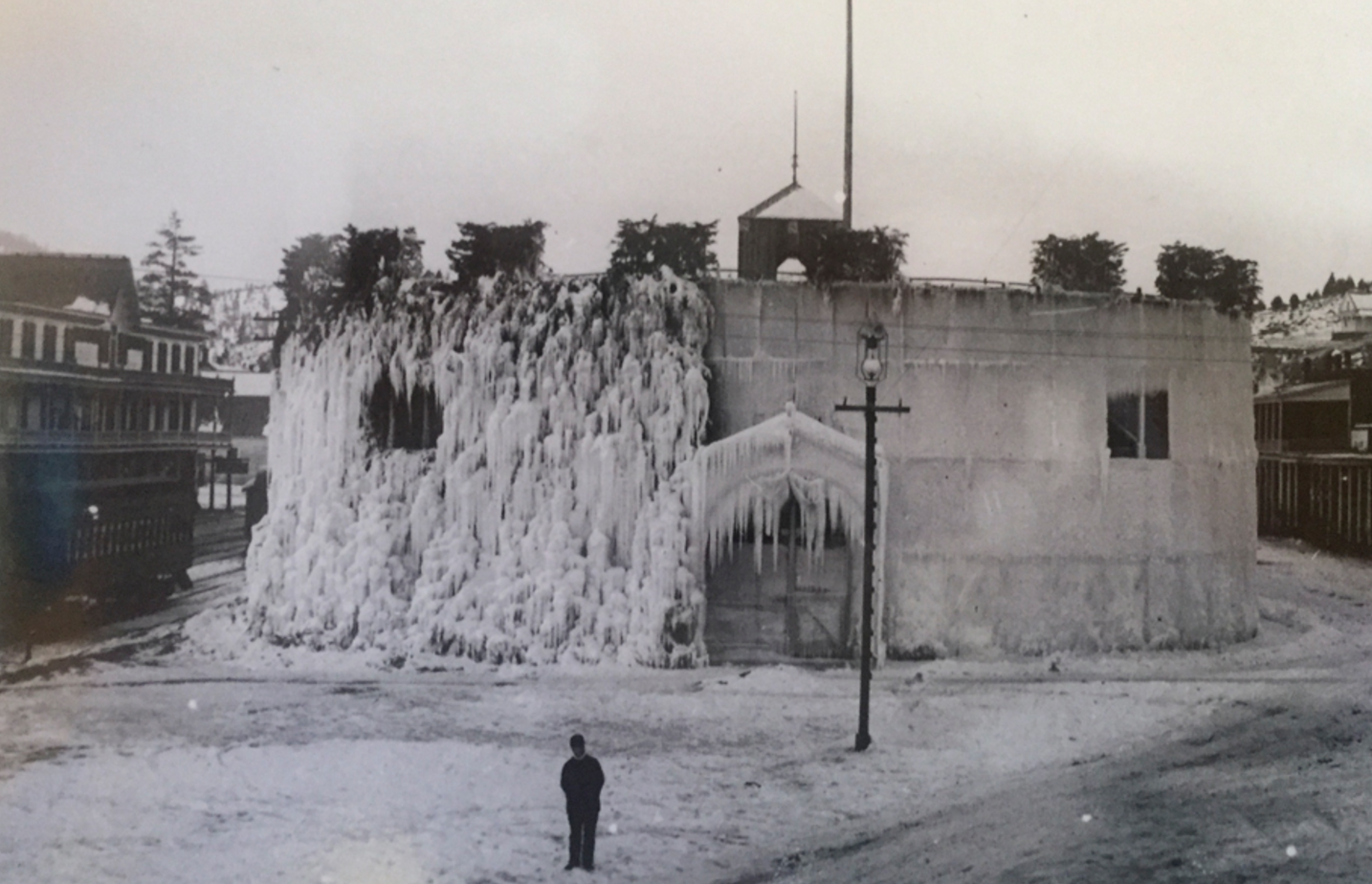 The first Truckee Ice Palace sat right in downtown Truckee next to the Truckee Hotel. The many icicles that made up the fortress walls were constantly glimmering in the sunlight. Photo courtesy Truckee Donner Historical Society