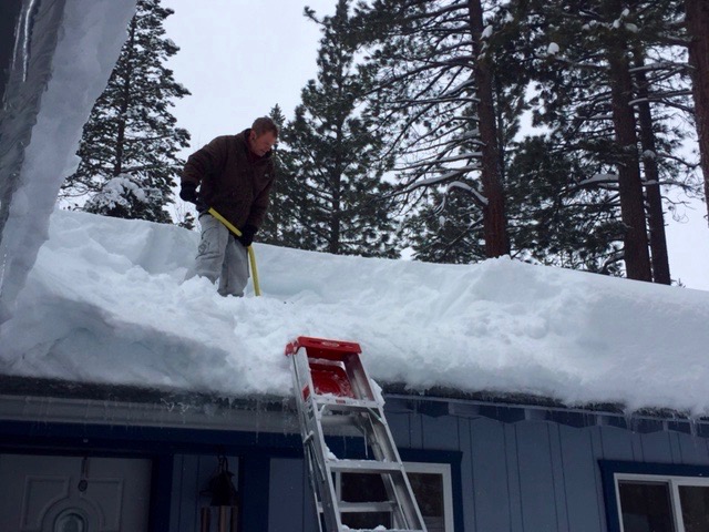 Now is the time to clear roofs of snow while there is a break in the weather. Photo/LTN