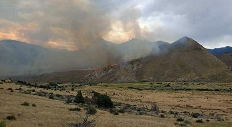 Slinkard Fire on Hwy. 395 continues to grow