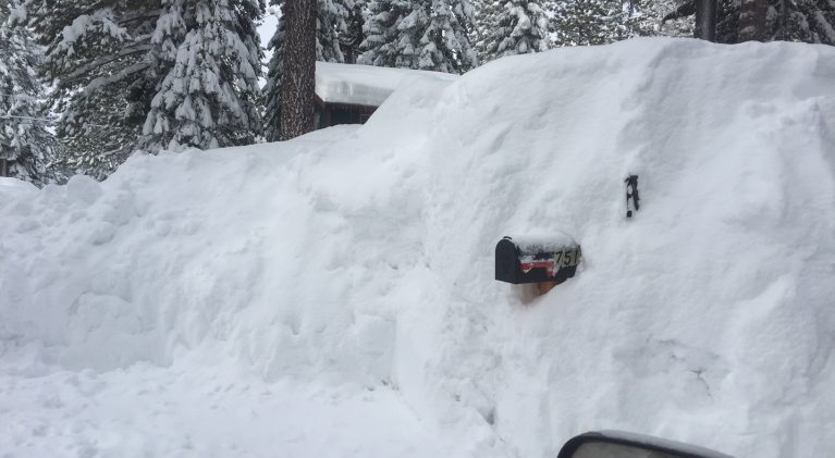 Snow covered mailboxes a problem for carriers